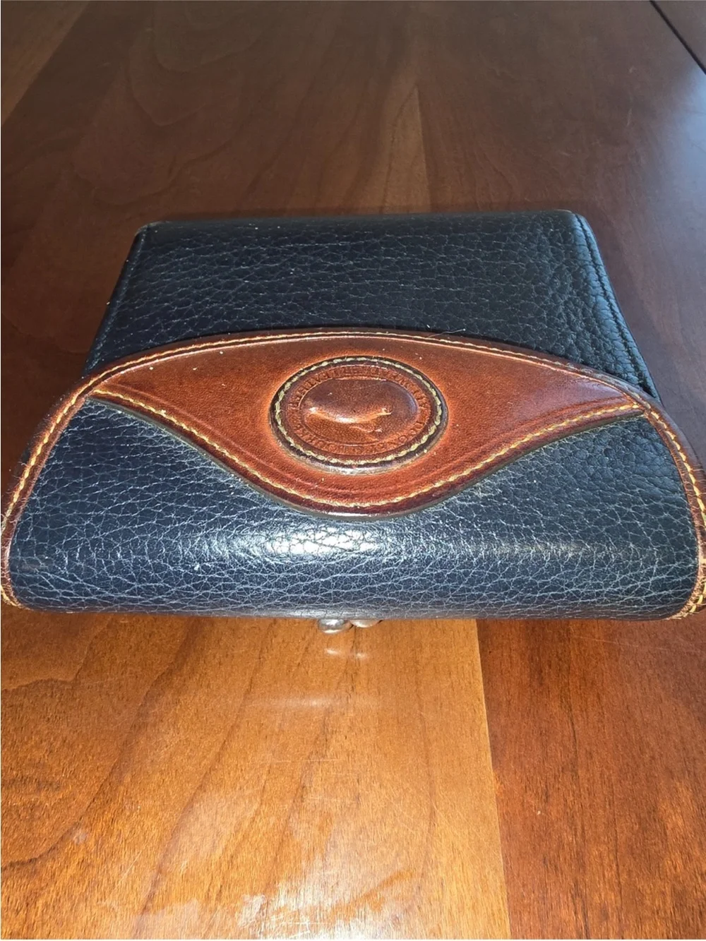 Dooney & Bourke Black and Brown Leather Bi-Fold Wallet vintage.